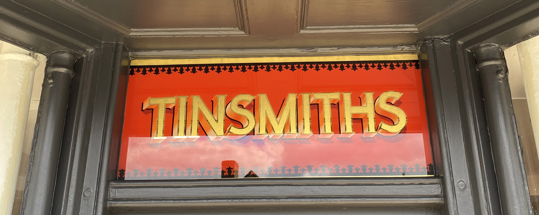 Tinsmiths Glass Sign Shop Door
