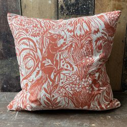 Mark Hearld Squirrel and sunflower cushion brick red